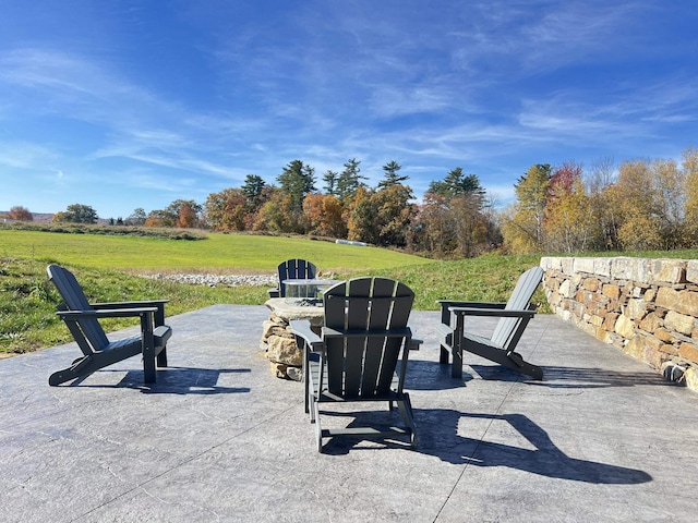 view of patio featuring a fire pit