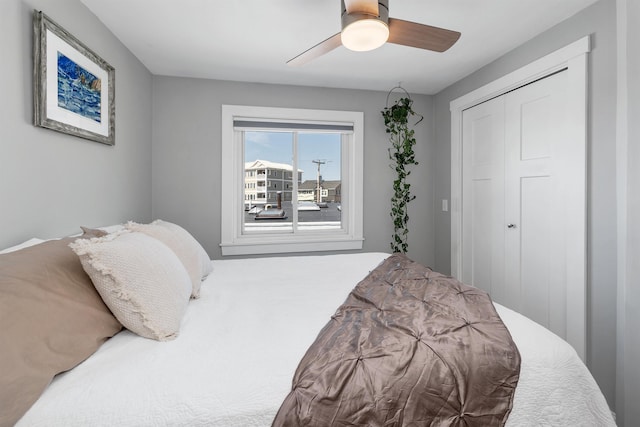 bedroom featuring a ceiling fan and a closet