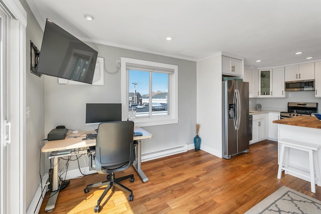 interior space with light wood finished floors, recessed lighting, baseboards, ornamental molding, and a baseboard radiator
