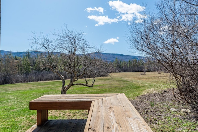exterior space featuring a forest view