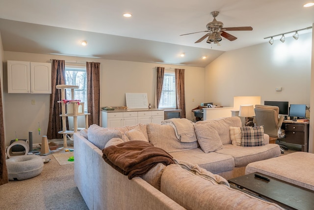living room with recessed lighting, ceiling fan, vaulted ceiling, and plenty of natural light