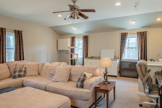 living room featuring ceiling fan, recessed lighting, vaulted ceiling, and light carpet