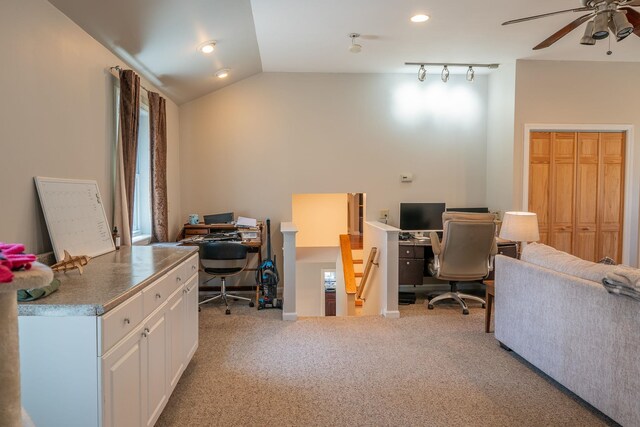 carpeted office with a ceiling fan, vaulted ceiling, and recessed lighting