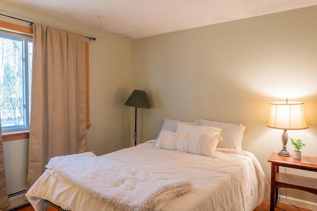 bedroom featuring baseboard heating