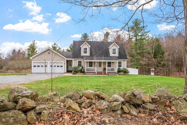cape cod home featuring a porch, a front lawn, gravel driveway, and a garage