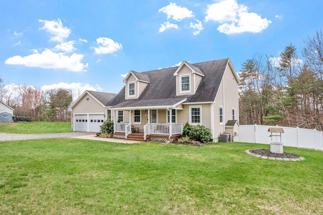 cape cod house featuring driveway, covered porch, central air condition unit, fence, and a front lawn
