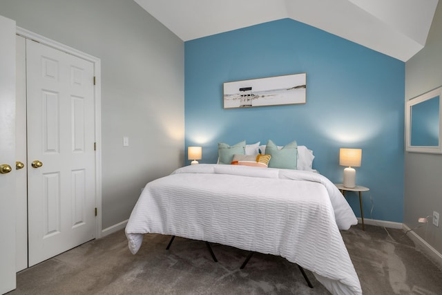 bedroom featuring carpet flooring, vaulted ceiling, and baseboards