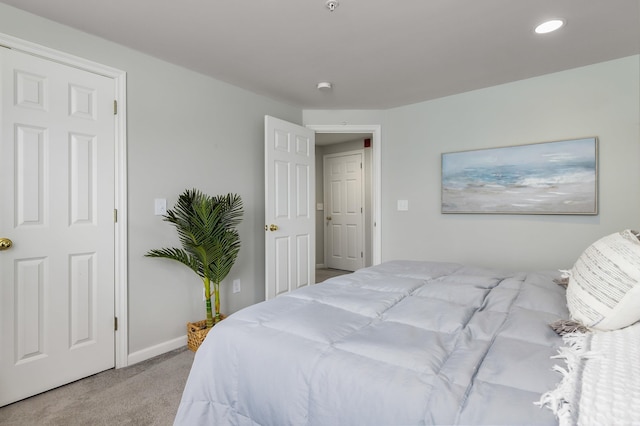 bedroom featuring carpet, recessed lighting, and baseboards