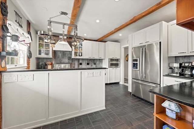 kitchen featuring decorative backsplash, stainless steel appliances, beamed ceiling, white cabinets, and dark countertops
