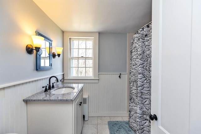 161 Upper Jaffrey Rd, Dublin, NH 03444 - bathroom featuring tile patterned floors, vanity, wainscoting, and radiator heating unit