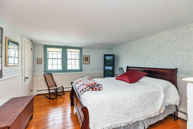 161 Upper Jaffrey Rd, Dublin, NH 03444 - bedroom featuring baseboard heating, wallpapered walls, and wood-type flooring