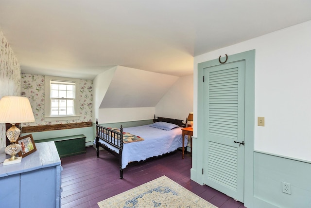 161 Upper Jaffrey Rd, Dublin, NH 03444 - bedroom with wallpapered walls, dark wood-style flooring, a baseboard radiator, and lofted ceiling