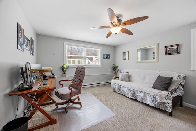 home office with a ceiling fan and a baseboard heating unit