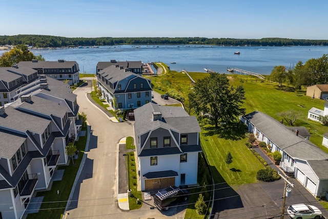 aerial view featuring a residential view and a water view