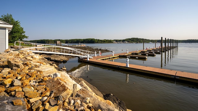 view of dock with a water view