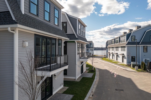 view of road with a residential view
