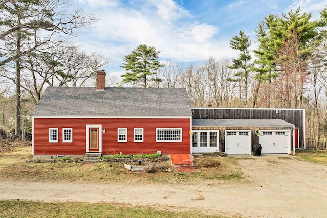 exterior space featuring dirt driveway