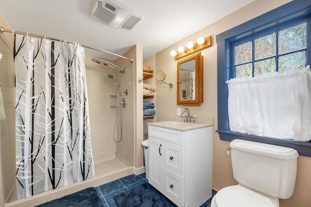 full bath featuring visible vents, a shower with shower curtain, toilet, tile patterned floors, and vanity
