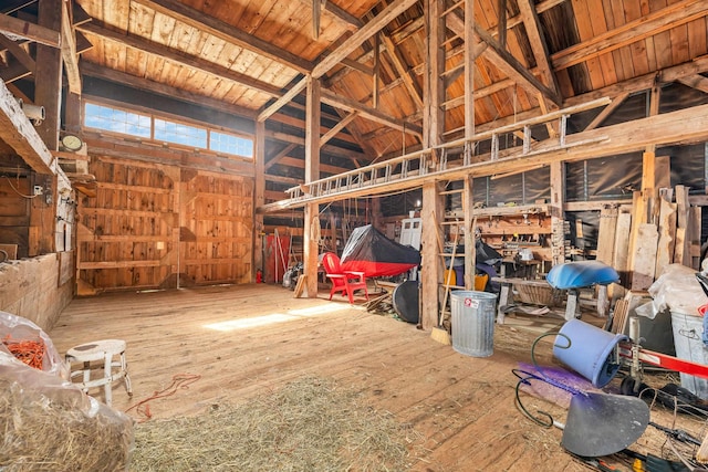 miscellaneous room featuring vaulted ceiling and wooden ceiling
