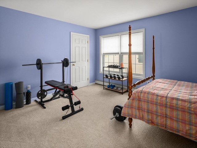 carpeted bedroom featuring baseboards