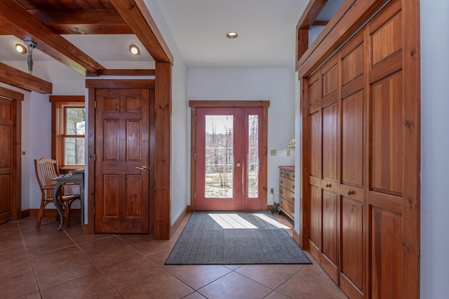 107-109 Baker Rd, Springfield, VT 05156 - foyer with dark tile patterned flooring, recessed lighting, and baseboards