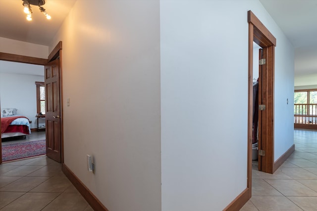 107-109 Baker Rd, Springfield, VT 05156 - hall featuring light tile patterned floors and baseboards