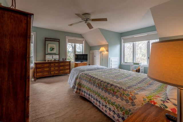 carpeted bedroom with a ceiling fan