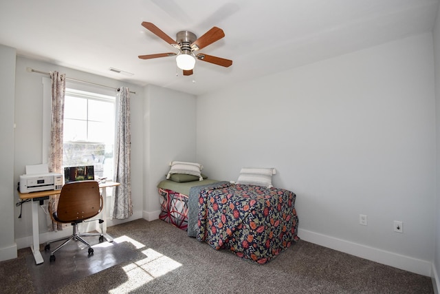 carpeted bedroom with visible vents, ceiling fan, and baseboards