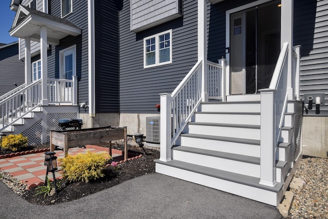 doorway to property with cooling unit