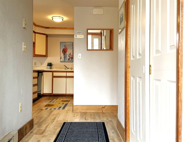 hall featuring light wood-style flooring