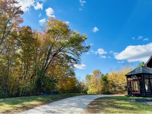 surrounding community with a lawn