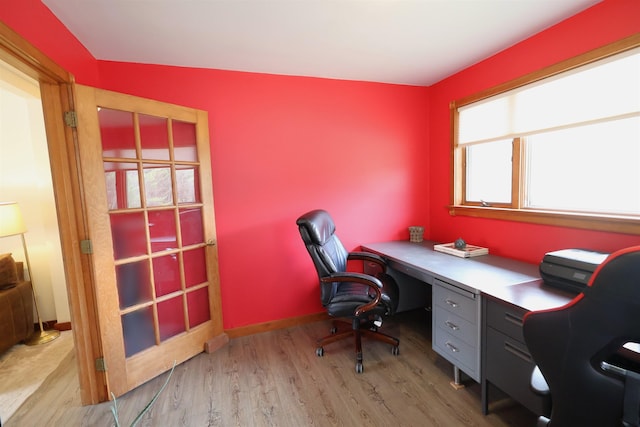 office featuring wood finished floors and baseboards
