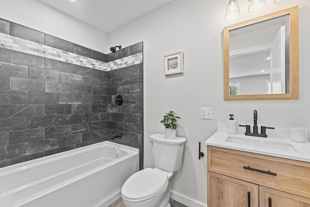 full bath with toilet, washtub / shower combination, vanity, and baseboards