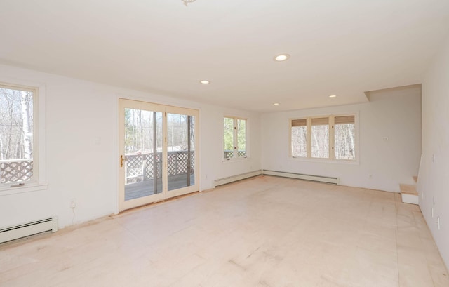 unfurnished room featuring recessed lighting and a baseboard radiator
