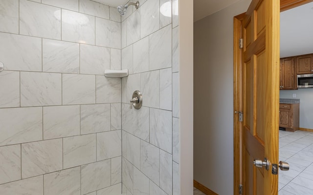 152 E St, Charlestown, NH 03603 - bathroom with baseboards and a tile shower