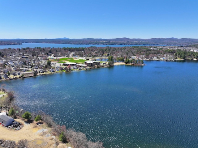 bird's eye view with a water and mountain view