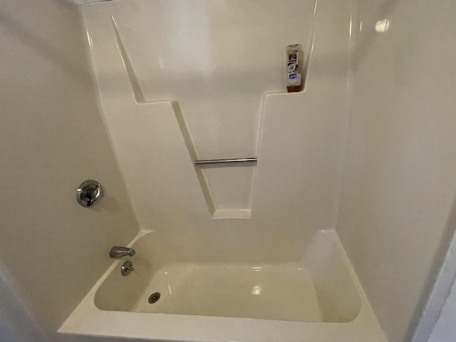 bathroom with shower / bathing tub combination