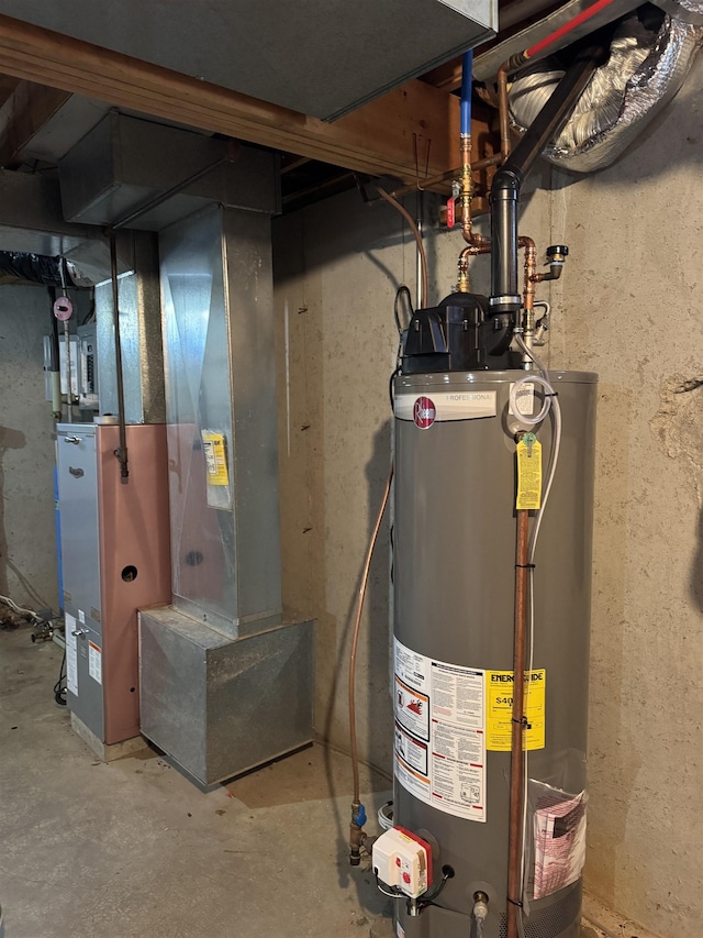utilities featuring heating unit and gas water heater