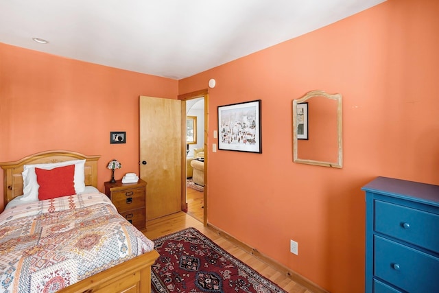 bedroom with light wood-style floors