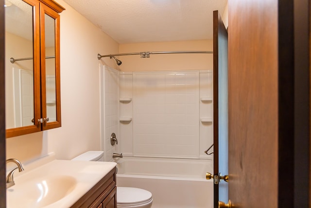 full bath with toilet, a textured ceiling, bathing tub / shower combination, and vanity