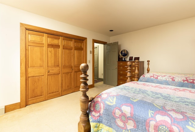 bedroom featuring a closet and carpet flooring