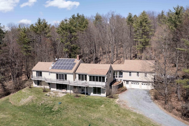 exterior space with a forest view