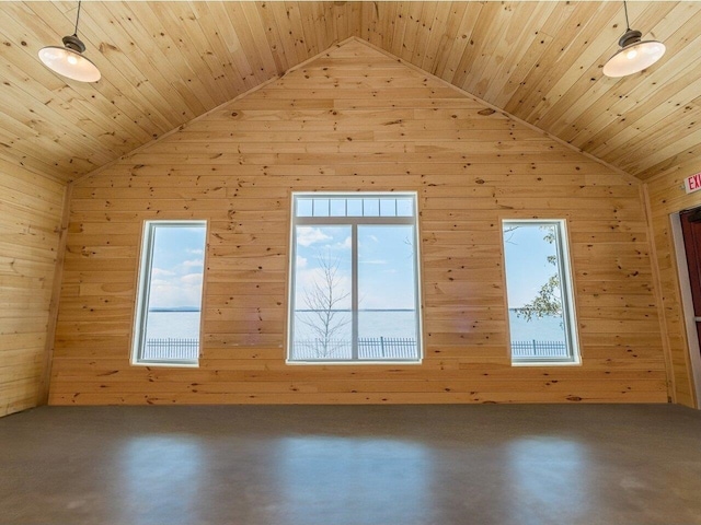 additional living space with a wealth of natural light, wood walls, vaulted ceiling, and wooden ceiling