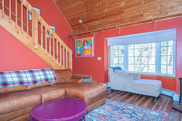 living room featuring wood finished floors, vaulted ceiling, and a healthy amount of sunlight