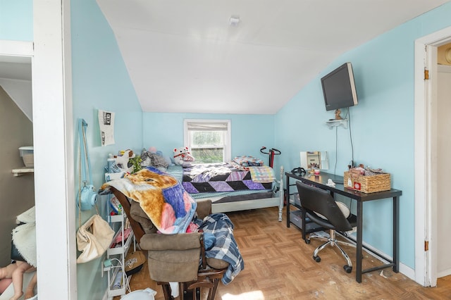 bedroom featuring lofted ceiling