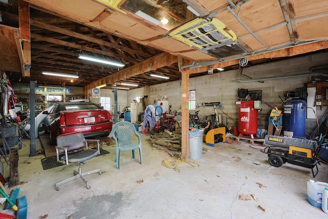 garage featuring concrete block wall
