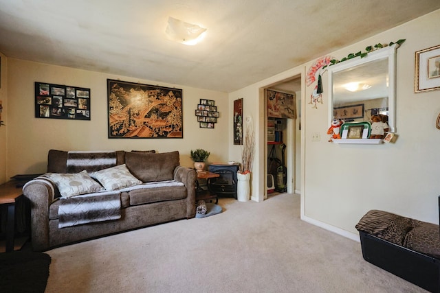 carpeted living room with baseboards