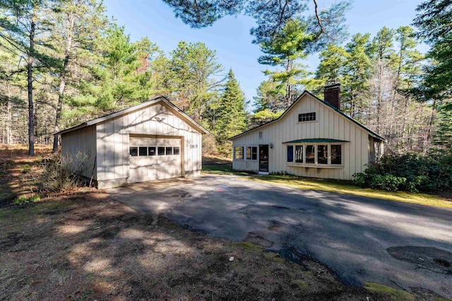 exterior space with aphalt driveway