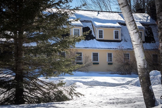 view of snow covered property