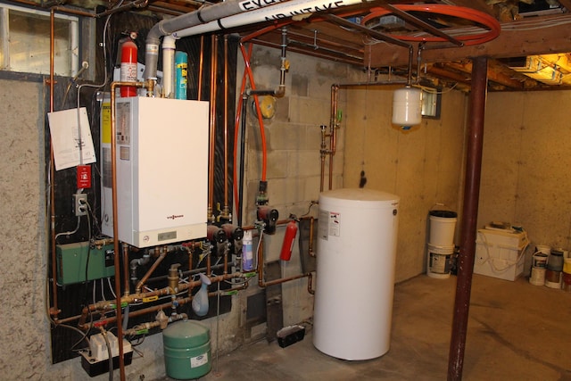 utility room featuring water heater and tankless water heater